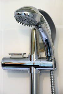 A Jacuzzi showerwand may be used in conjunction with a slide bar to change positions.