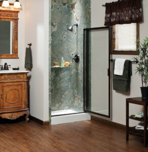 Small bathroom remodel with a green shower wall