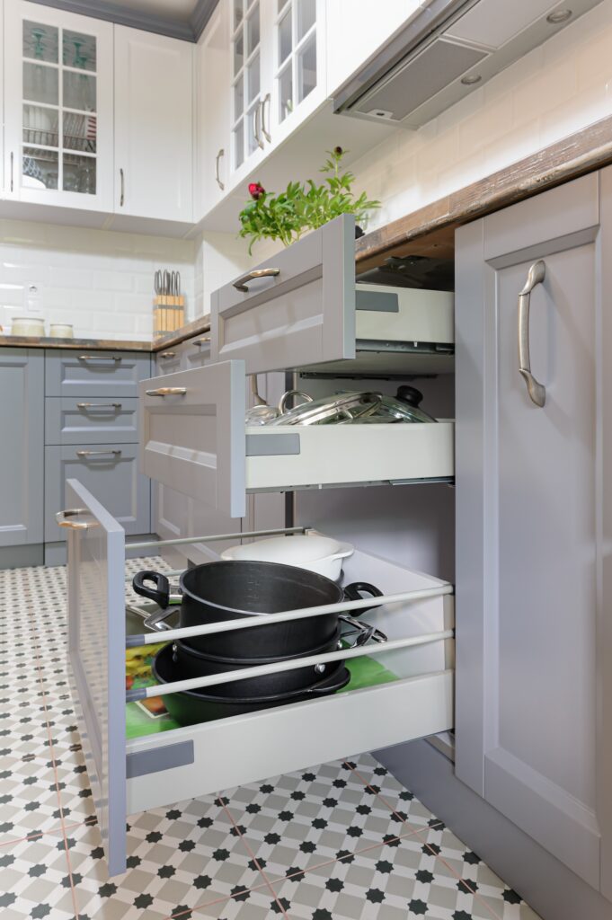 Discover practical kitchen cabinet ideas and must have kitchen cabinet features that improve storage, organization, and everyday convenience.