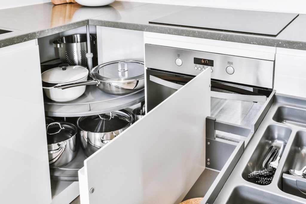 Discover practical kitchen cabinet ideas and must have kitchen cabinet features that improve storage, organization, and everyday convenience. 